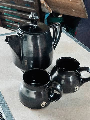 pottery teapot and pottery mugs